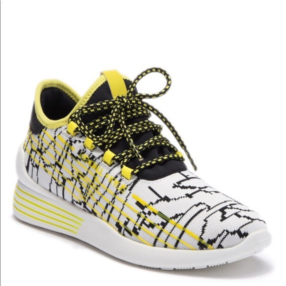 Kendall & Kylie black and white fashion sneakers with yellow detail.